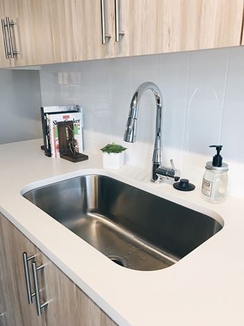 Euro-style cabinetry with quartz countertops